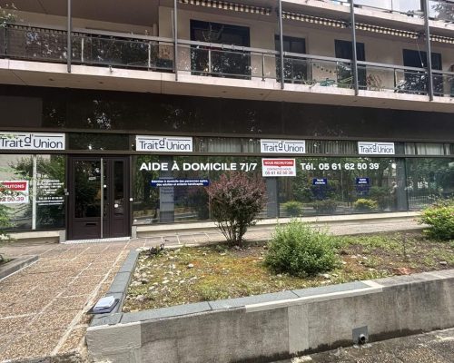 Façade de l’agence Trait d’Union à Toulouse – Aide à domicile 7j/7